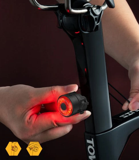 TOWILD TL03 Lumină spate bicicletă Frână Sensare automată Lampă spate bicicletă Reîncărcabilă USB Lumină spate IPX7 Impermeabil 3 moduri de siguranță Ultra strălucitoare pentru călătorie în siguranță pe timp de noapte